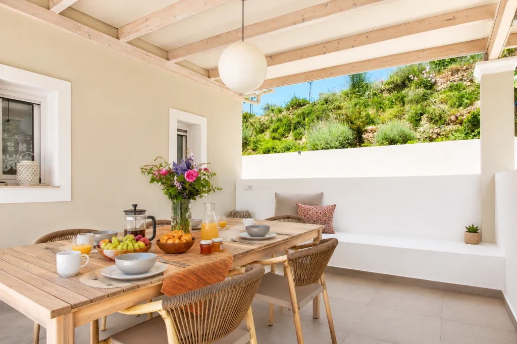 giardinia corfu holiday homes outdoor breakfast terrace garden view