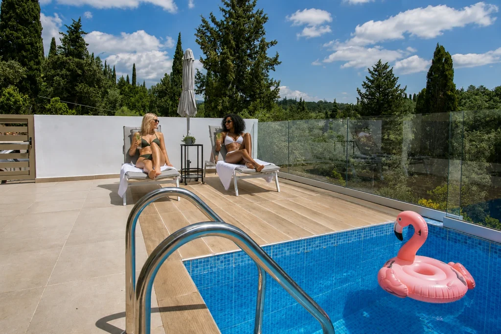 giardinia corfu holiday homes pool loungers flamingo float
