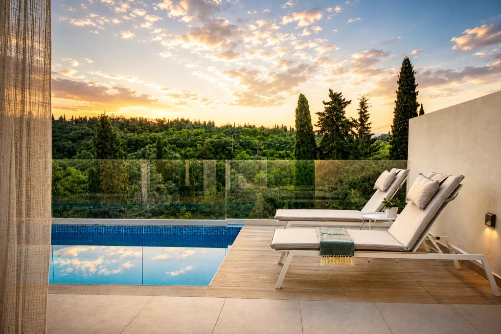 giardinia corfu holiday homes pool loungers sunset